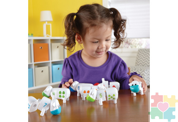 Развивающая игрушка  "Телята. Веселый счет" (серия Snap-N-Learn, 20 элементов)