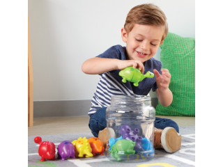 Развивающая игрушка "Собери динозавриков" (серия Snap-N-Learn, 18 элементов)