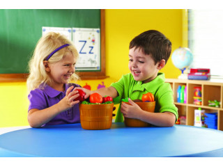 Развивающая игрушка "Фрукты в ведерке" (серия New Sprouts, 10 элементов)